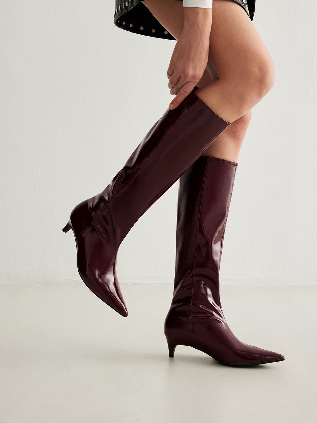 Burgundy Patent Knee-High Boots with Pointed Toe and Kitten Heel